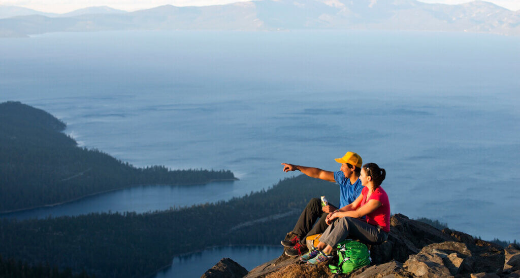 Hikers enjoying the view on the top of Mt Tallac