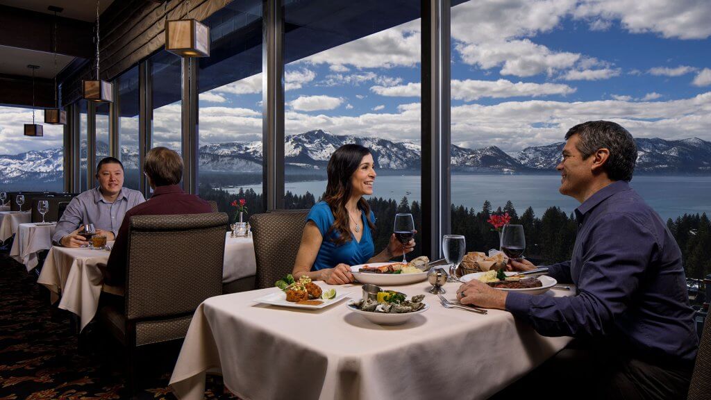 Couple enjoying the Sage Room inside Harveys Resort Lake Tahoe