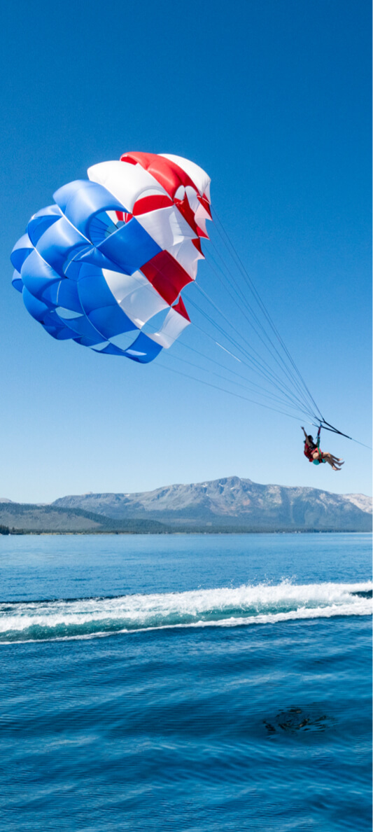 Couple parasailing in Lake Tahoe